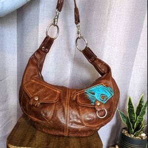 Stitch & Swash leather peacock feather crossbody